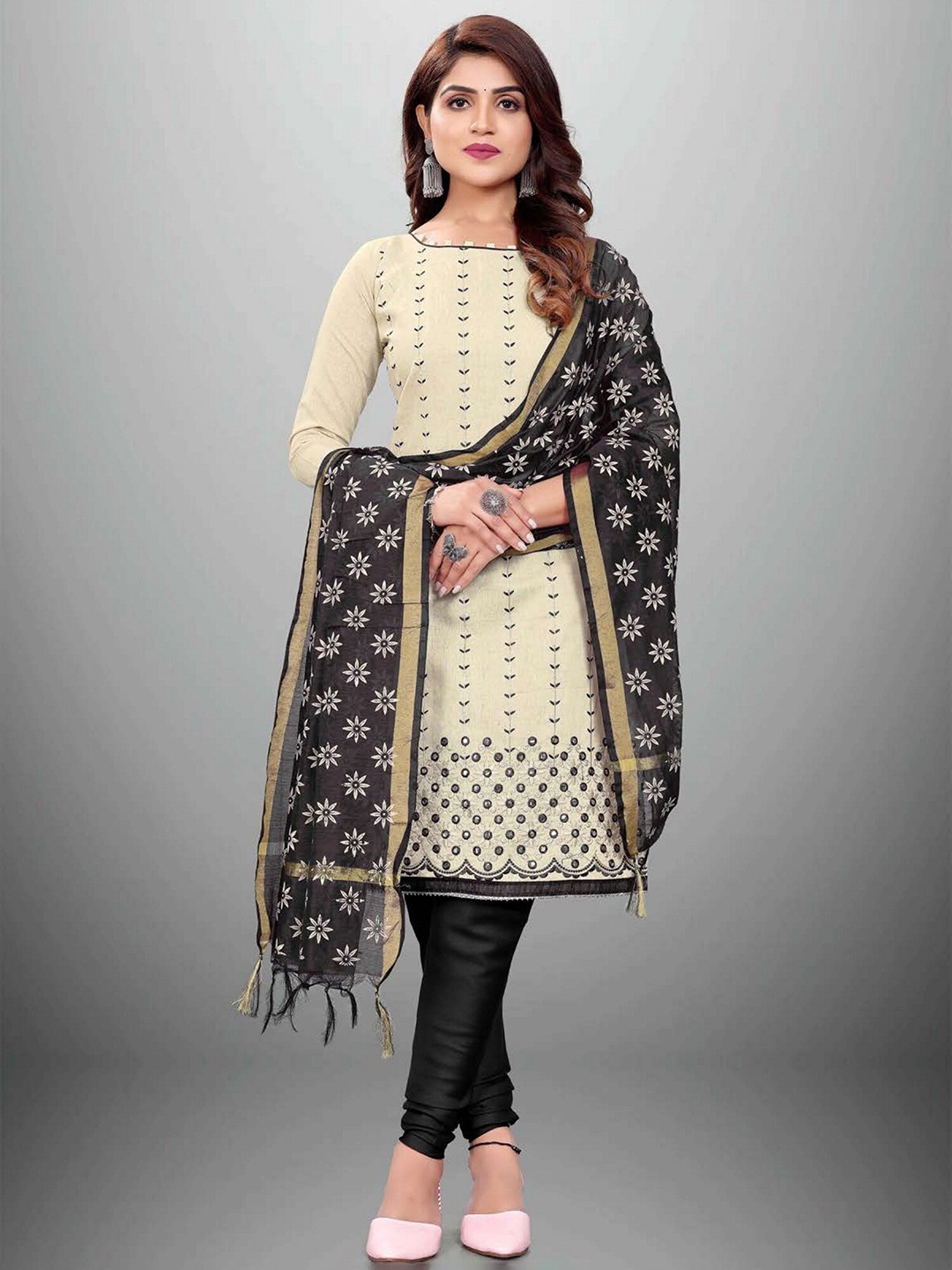 

APNISHA Black & Beige Embroidered Unstitched Dress Material