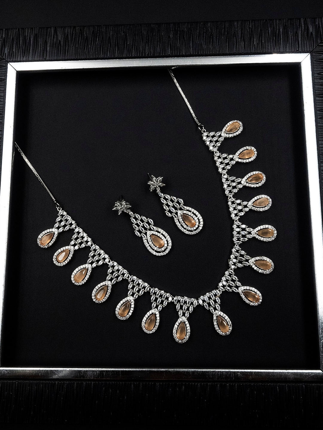 

StileAdda Silver Plated American Diamond & Cubic Zirconia Studded Jewellery Set