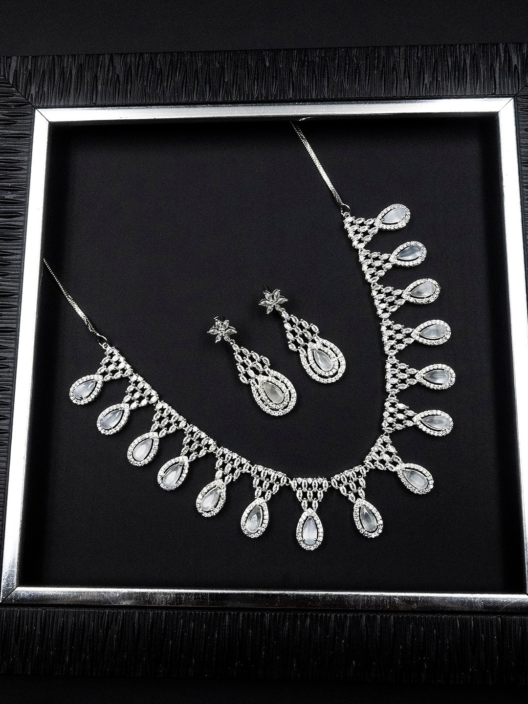 

StileAdda Silver Plated American Diamond & Cubic Zirconia Studded Jewellery Set