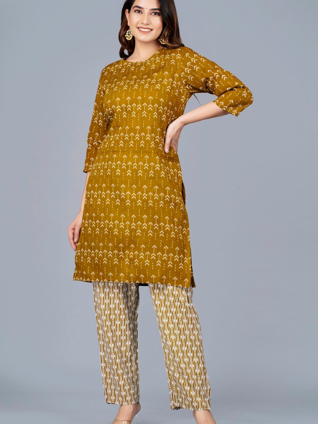 

SIPET Ethnic Motifs Printed Regular Kurta with Trousers, Mustard