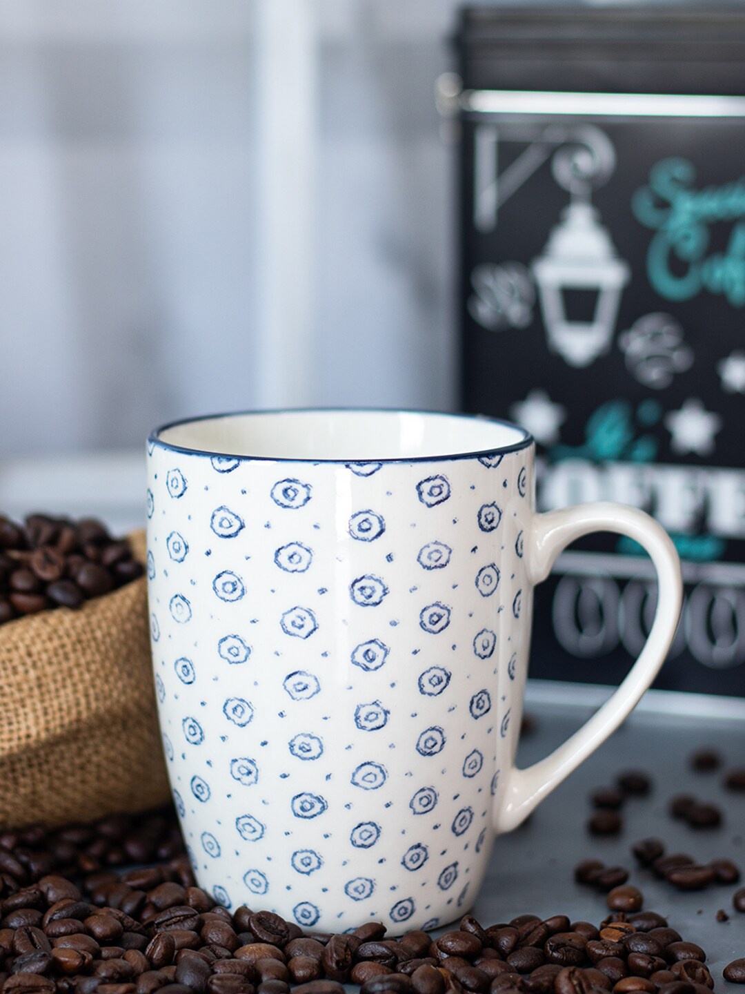 

MARKET99 White & Blue Printed Ceramic Glossy Coffee Mug - 380 ML