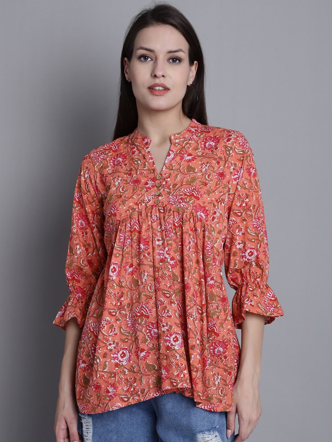 

Rajnandini Floral Printed Mandarin Collar Pure Cotton Empire Top, Orange