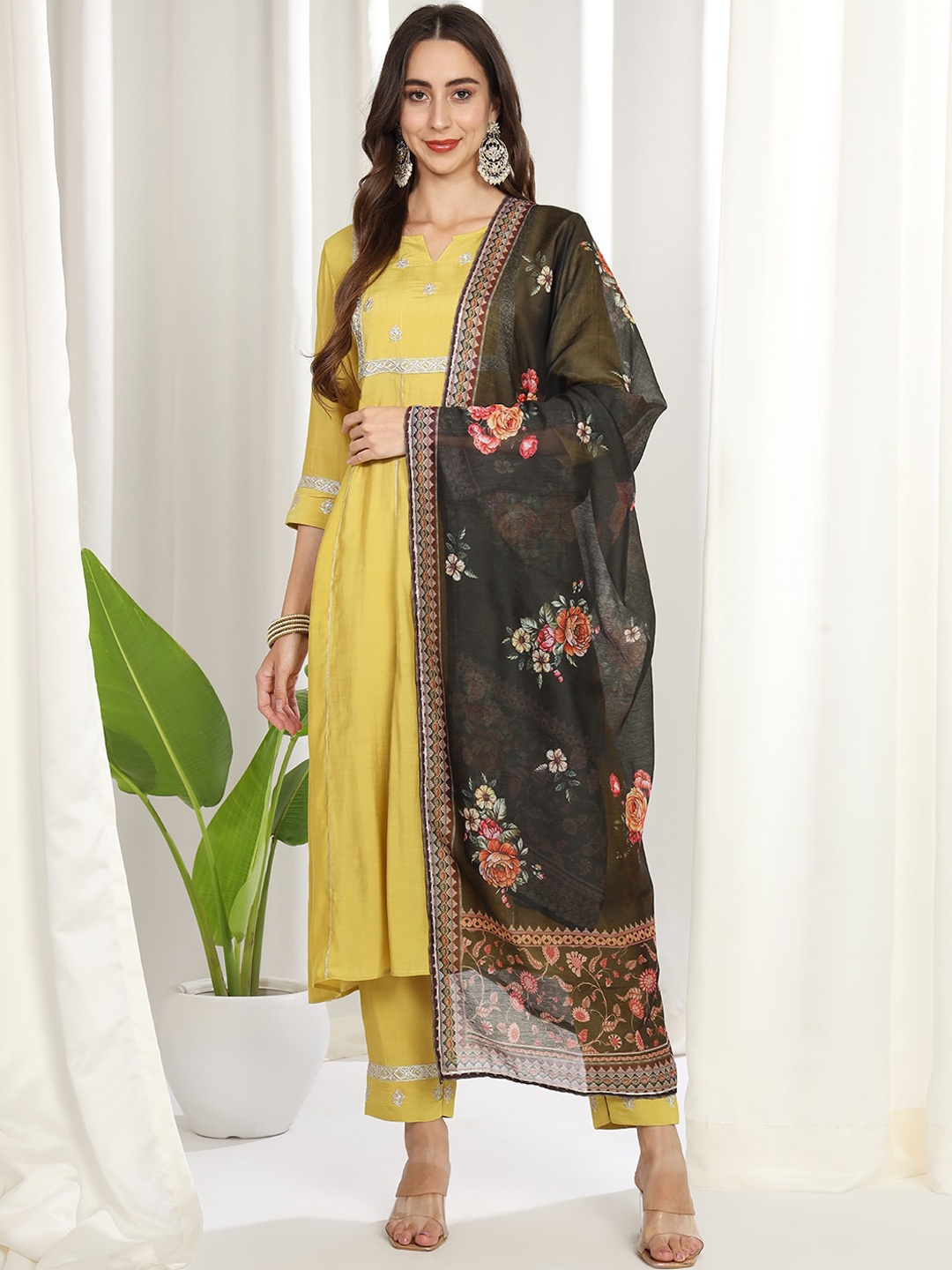 

MESMORA FASHION Women Yellow Floral Embroidered Regular Kurta with Trousers & With Dupatta