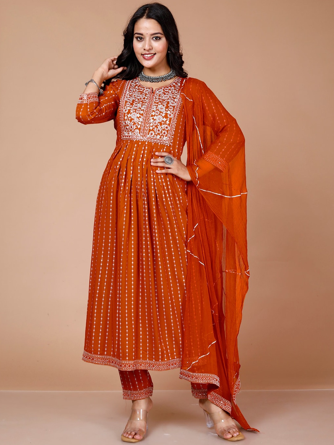

HERE&NOW Women Rust Printed Regular Thread Work Kurta with Trousers & With Dupatta