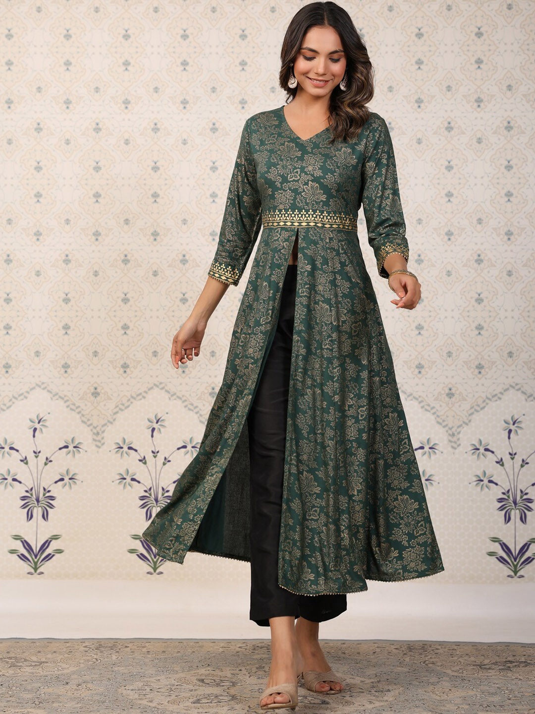 

Ode by House of Pataudi Women Green Ethnic Motifs Yoke Design Flared Sleeves Thread Work Kurta