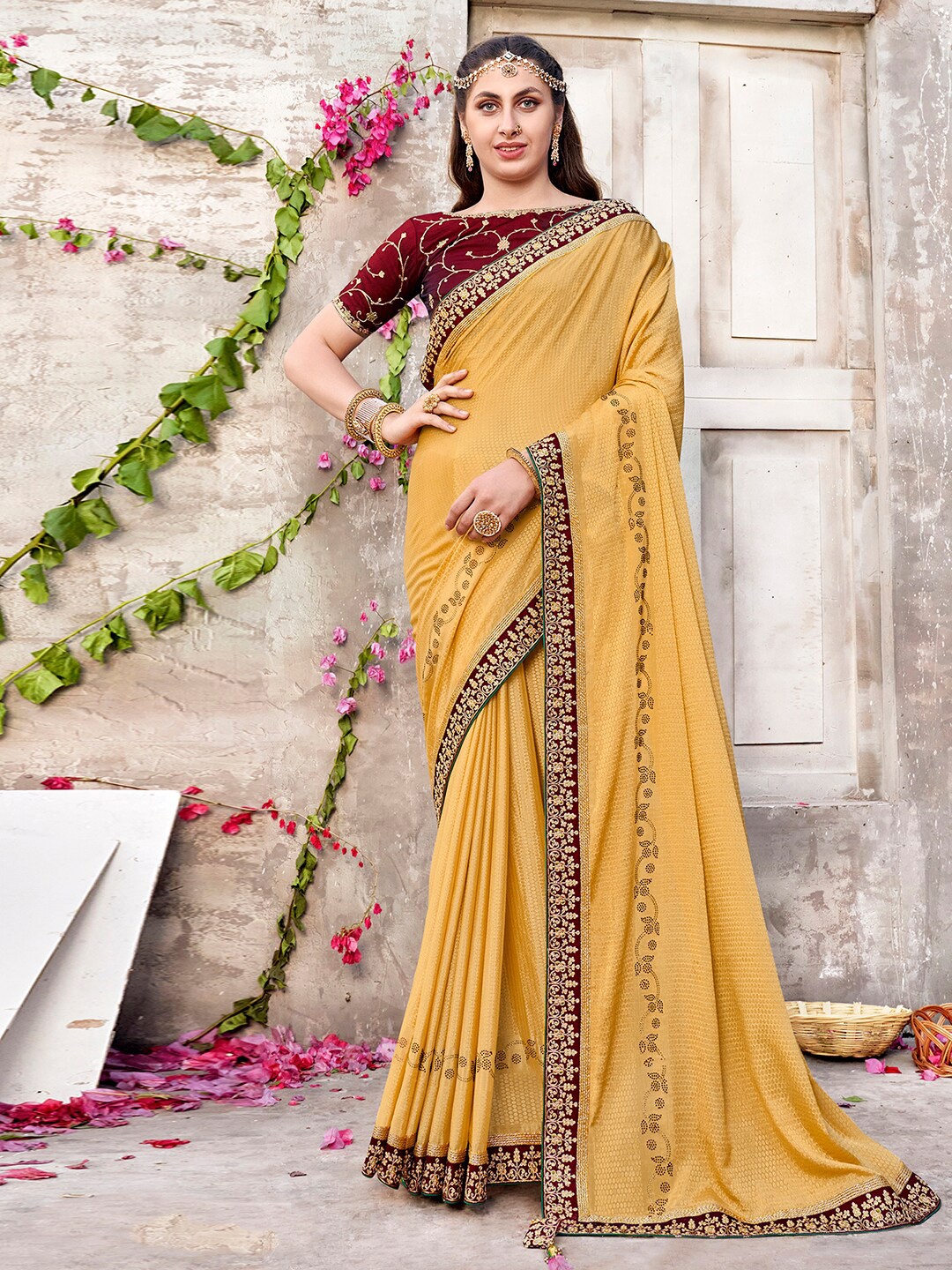 

Mitera Yellow & Gold-Toned Embellished Saree