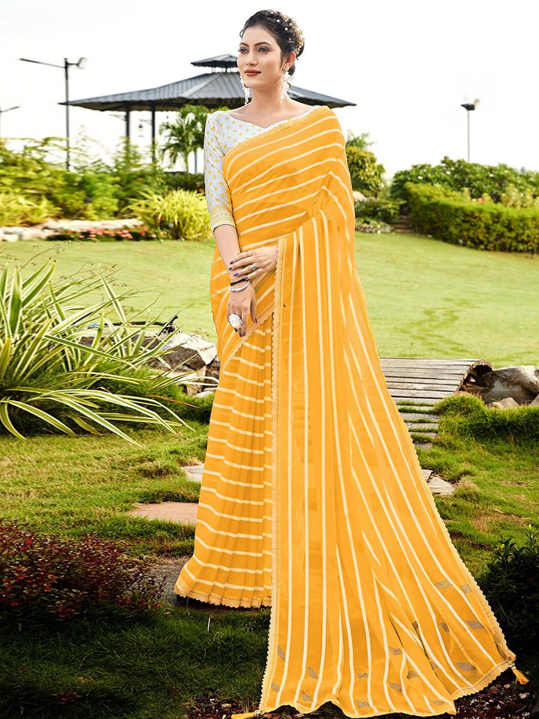 

Mitera Yellow & White Striped Saree