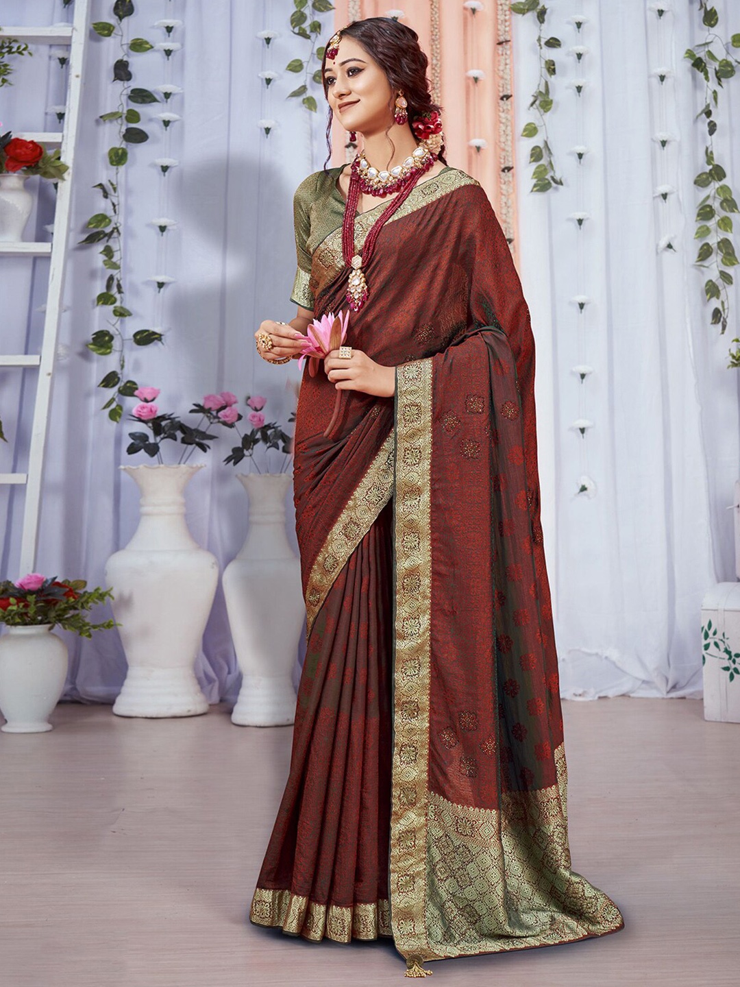 

Mitera Maroon Ethnic Motifs Woven Design Zari Art Silk Saree