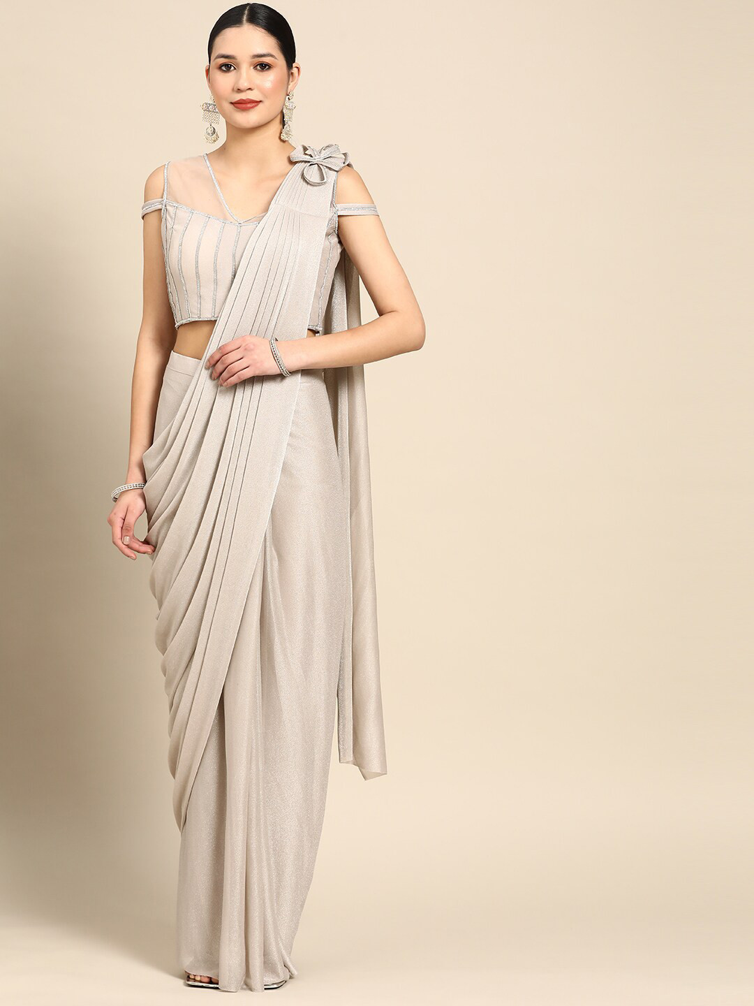 

Mitera Beige & Silver-Toned Beads And Stones Ready to Wear Saree