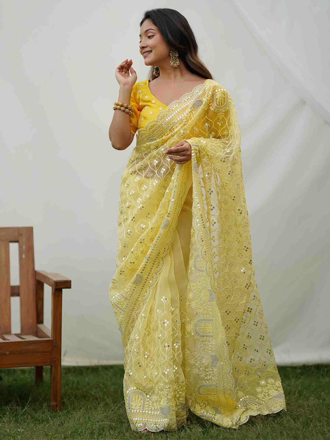 

Vastrasky Global Ethnic Motifs Embroidered Sequinned Organza Saree, Yellow