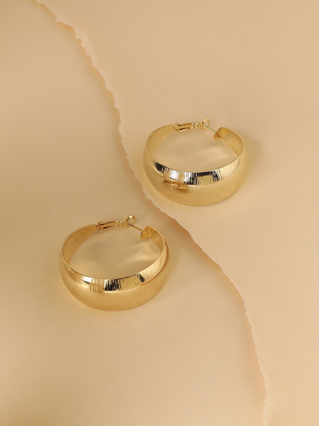 

SOHI Gold-Plated Contemporary Hoop Earrings