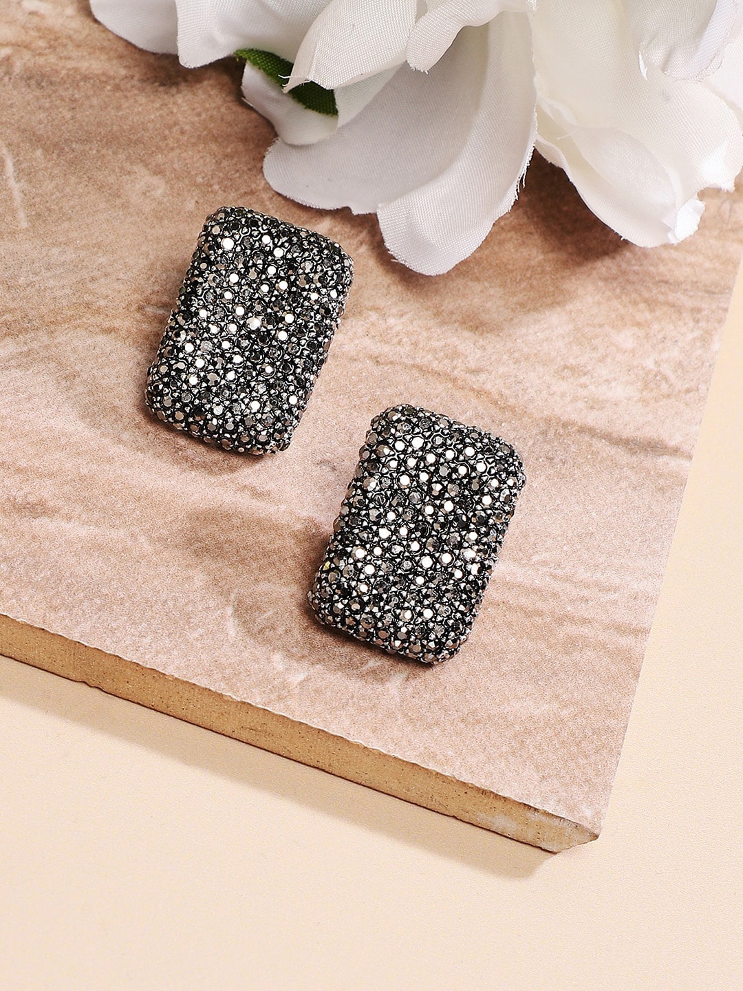

SOHI Silver-Plated Contemporary Stud Earrings