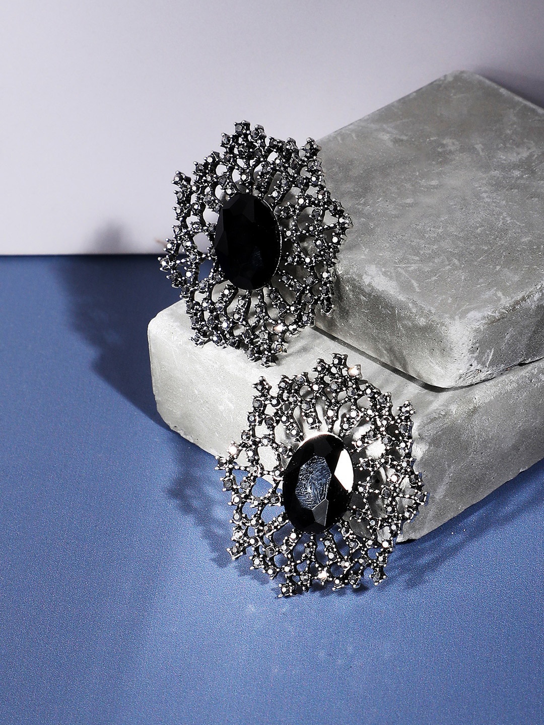 

SOHI Silver-Plated Contemporary Stud Earrings