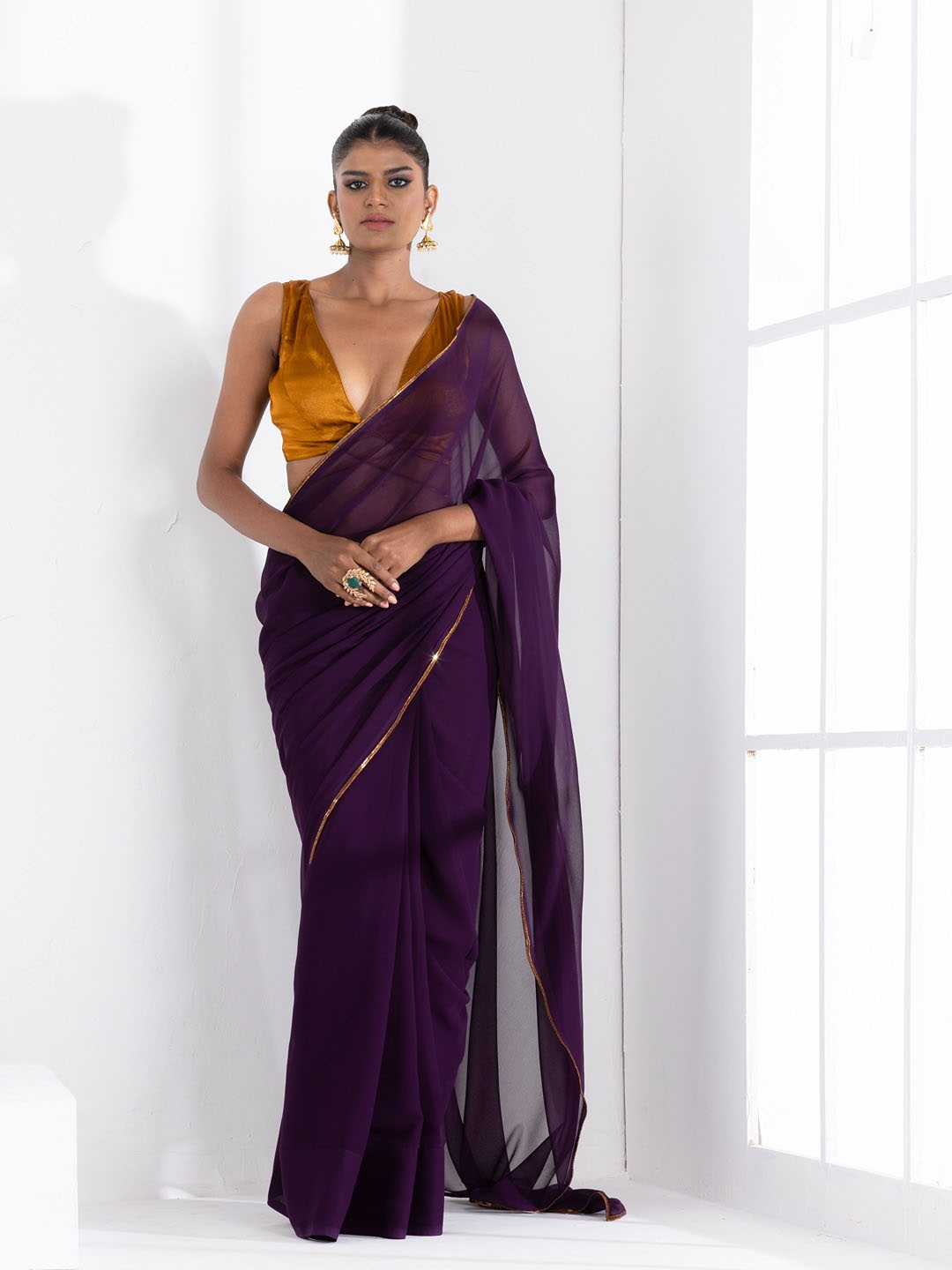 

Swtantra Solid Zari Detail Saree, Violet