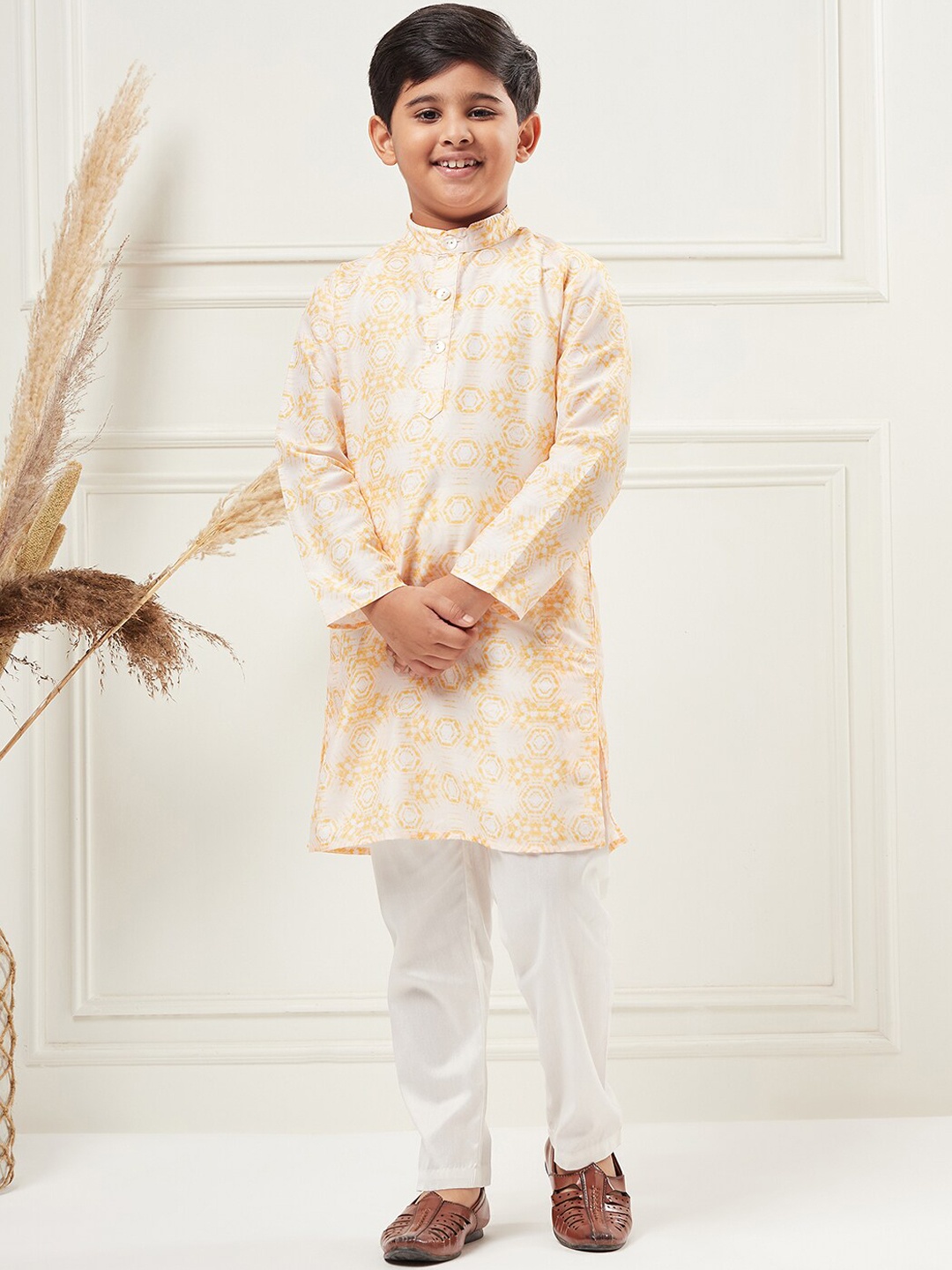 

Stylo Bug Boys Ethnic Motifs Printed Band Collar Regular Kurta With Trousers, Yellow