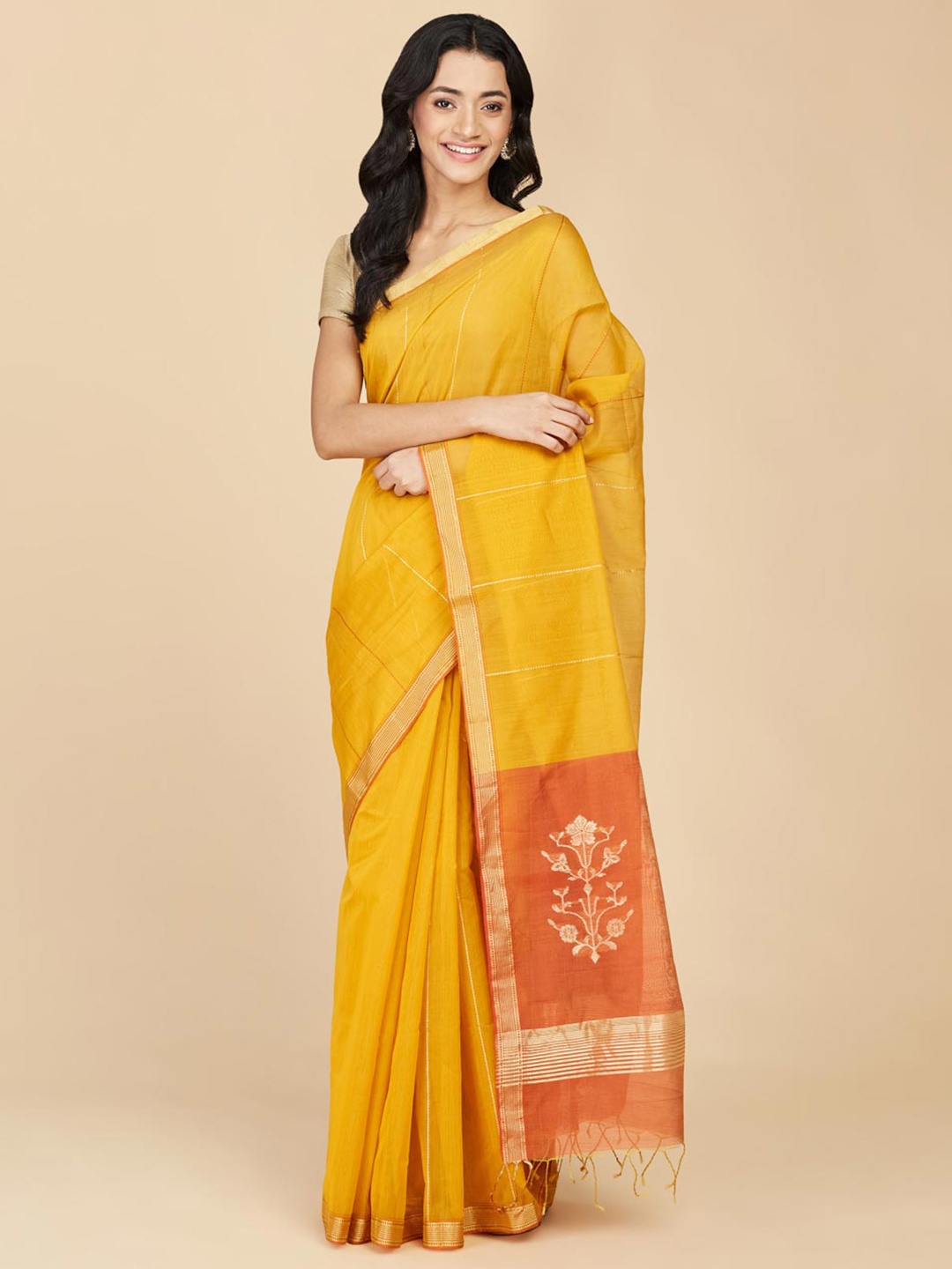 

Fabindia Mustard & Orange Striped Zari Silk Cotton Saree