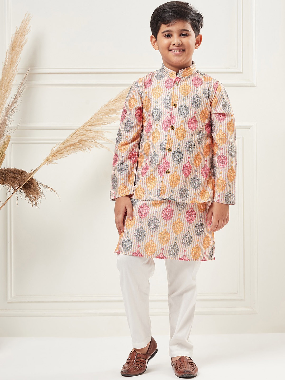 

Stylo Bug Boys Ethnic Motifs Printed Regular Kurta With Trousers & Nehru Jacket, Cream