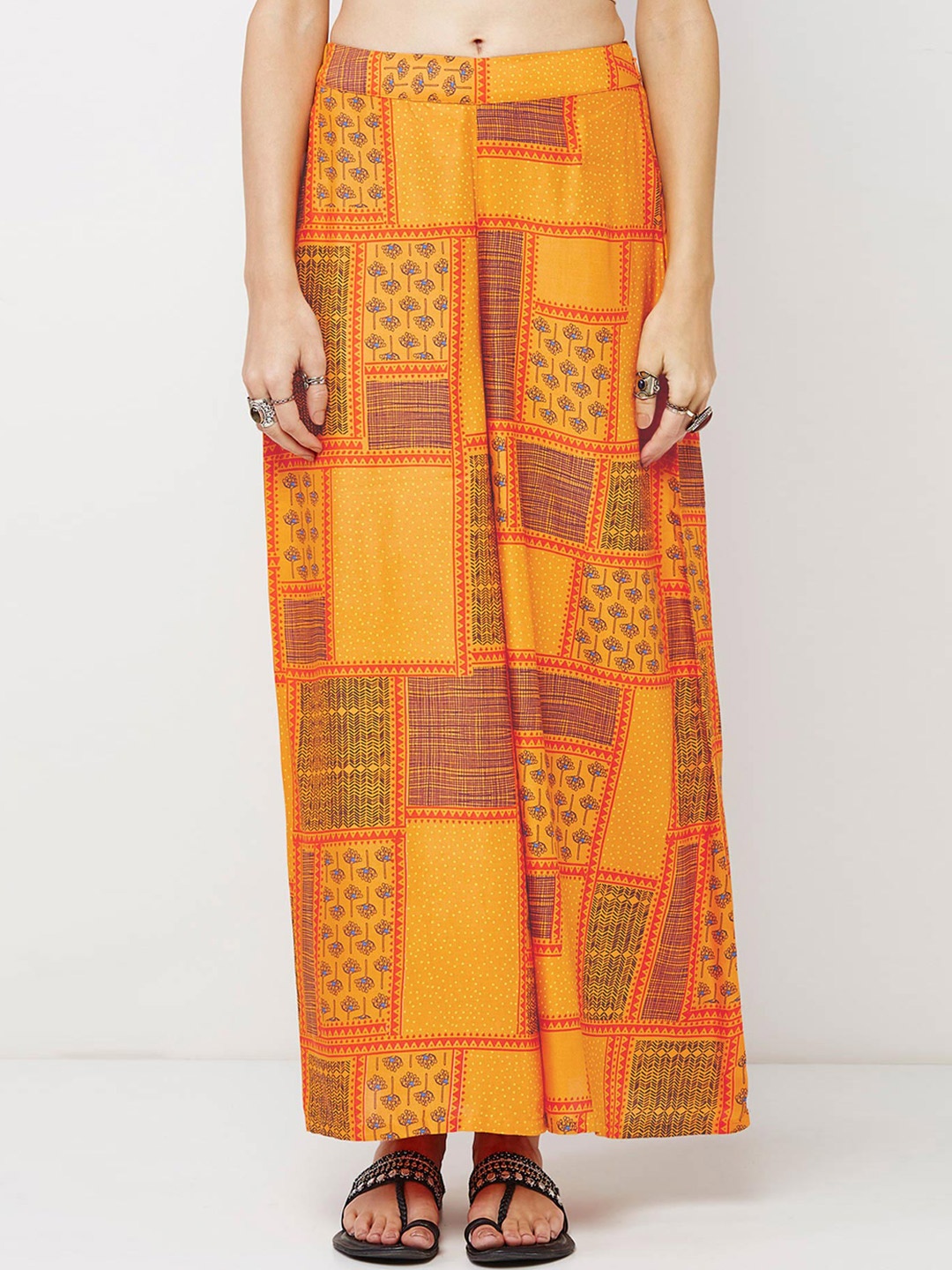 

Global Desi Women Orange Flared Printed Palazzos
