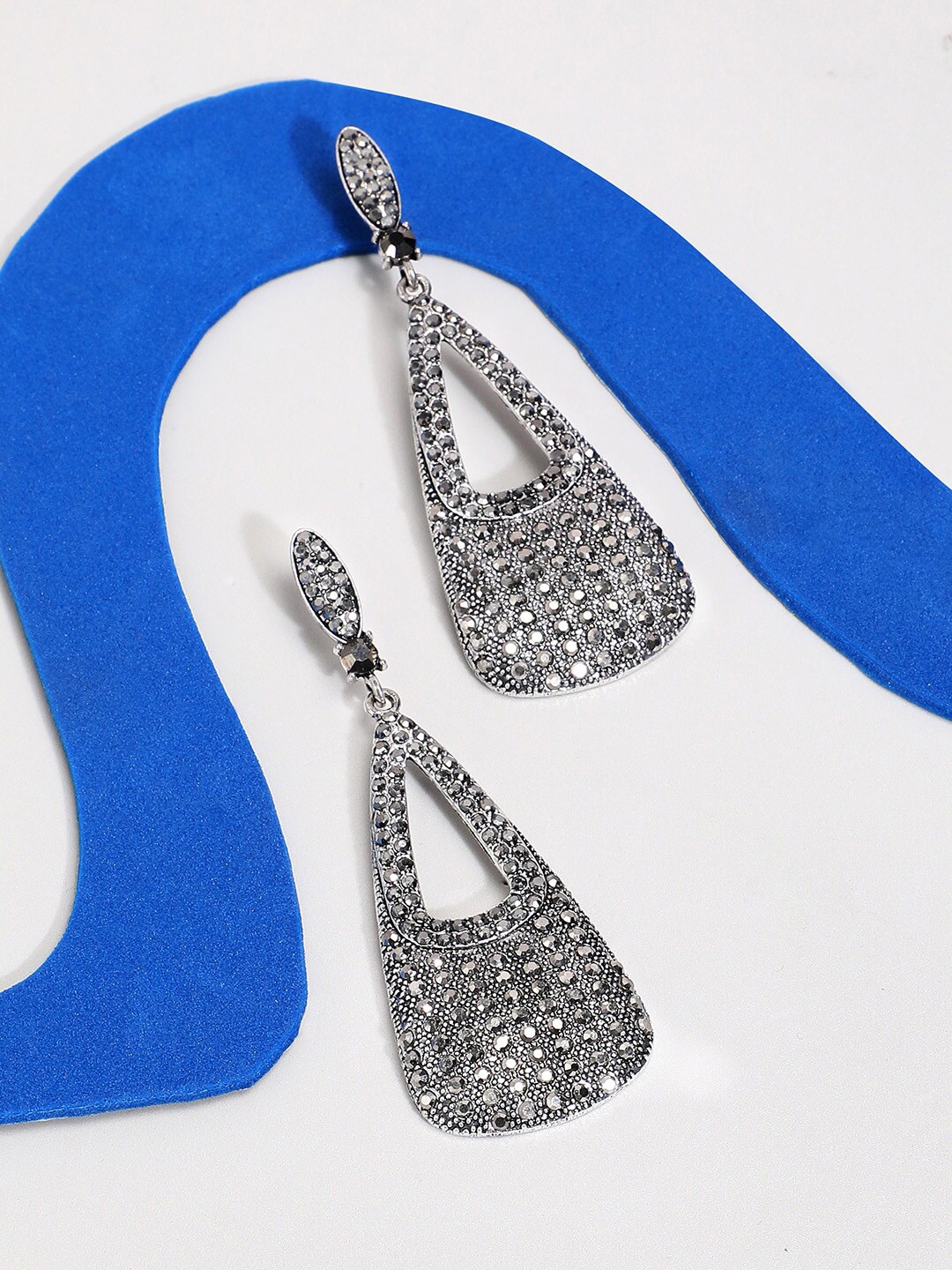 

SOHI Silver-Plated Contemporary Drop Earrings