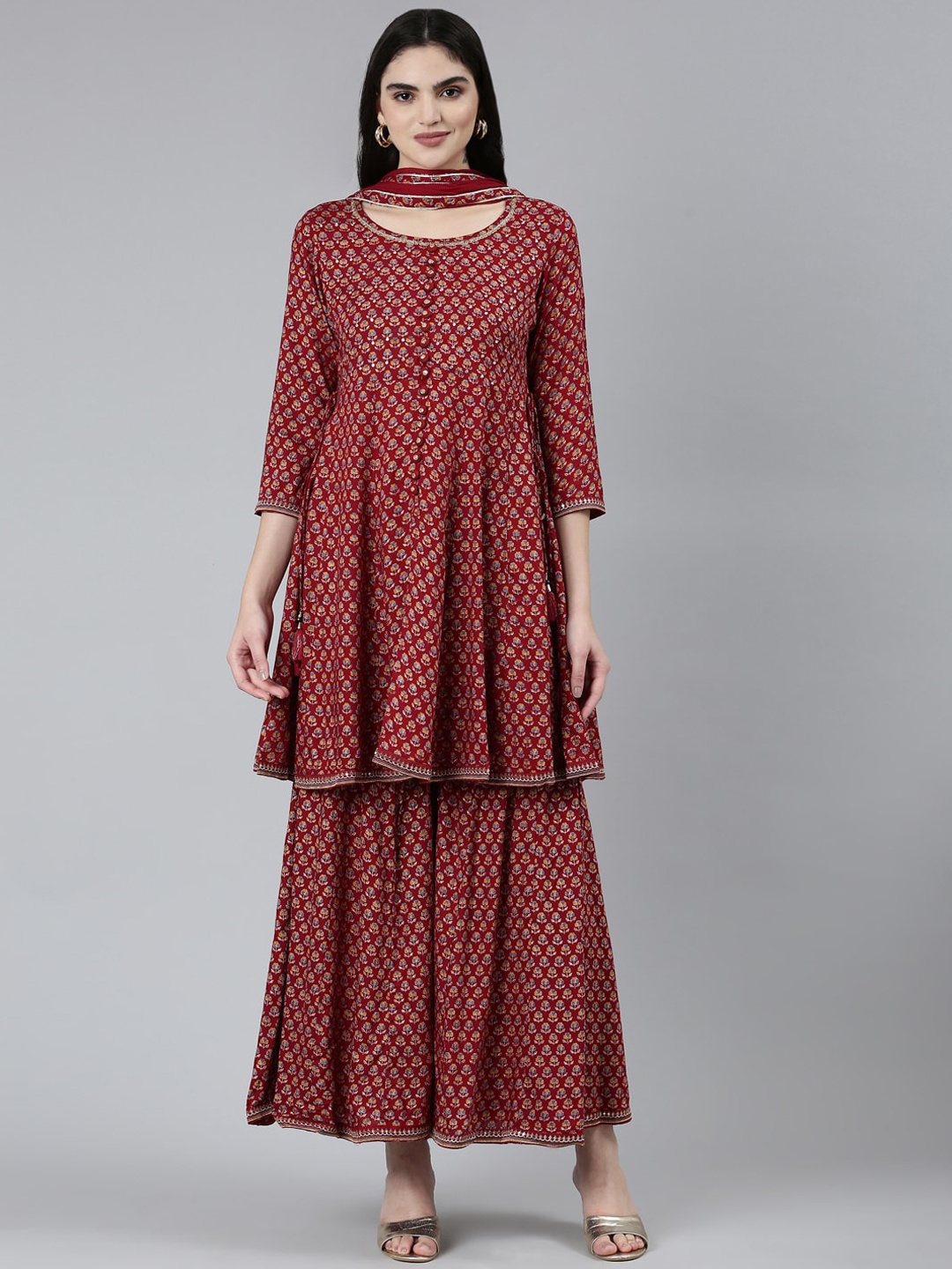 

Neerus Ethnic Motifs Printed Regular Sequinned Kurta with Sharara & Dupatta, Maroon