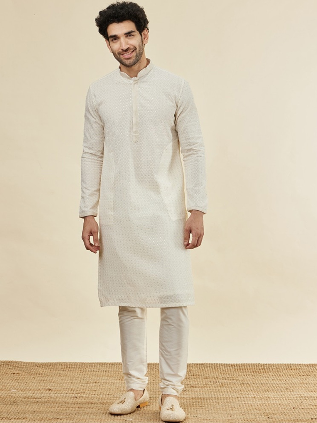 

Manyavar Ethnic Motifs Embroidered Sequinned Kurta with Churidar, Cream