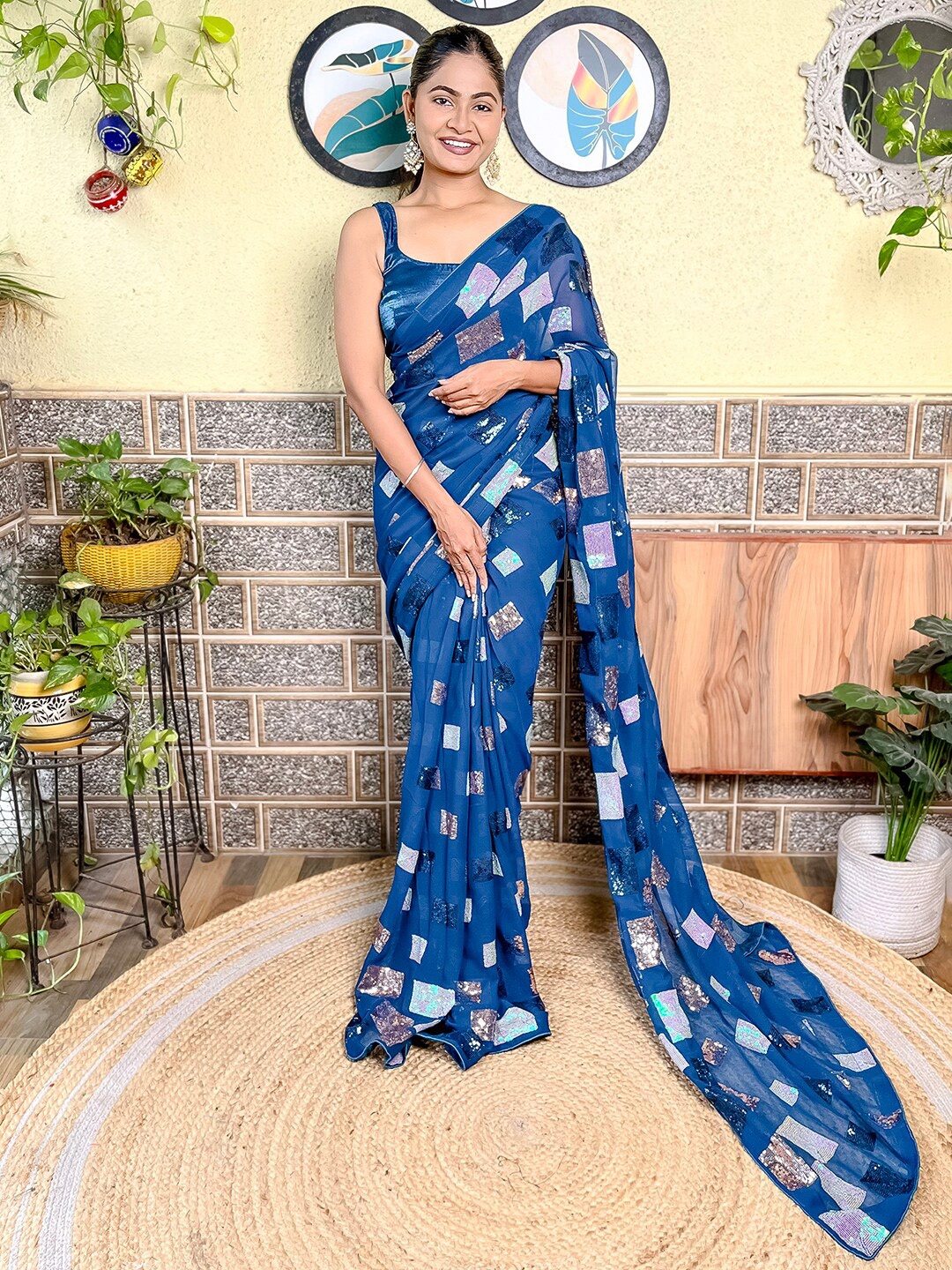 

Mitera Teal Blue Geometric Embellished Sequinned Saree