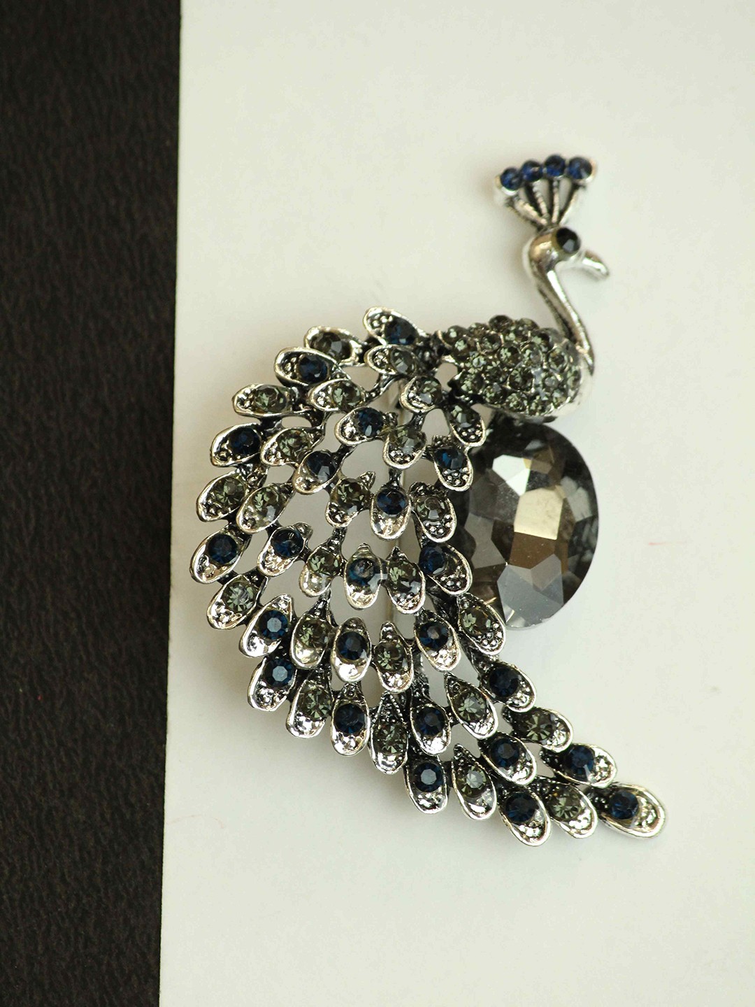 

Tossido Silver Peacock Brooch