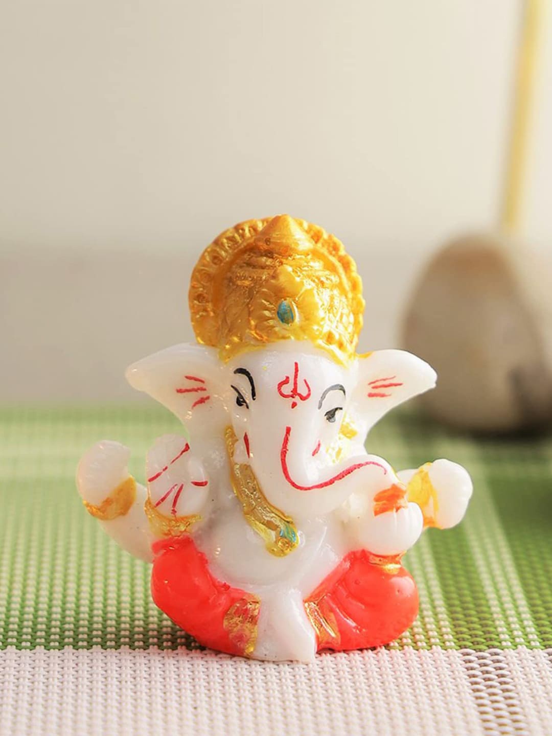 

CraftVatika White & Orange Lord Shiv Parvati Ganesh Kartik Idol Ceramic Showpiece