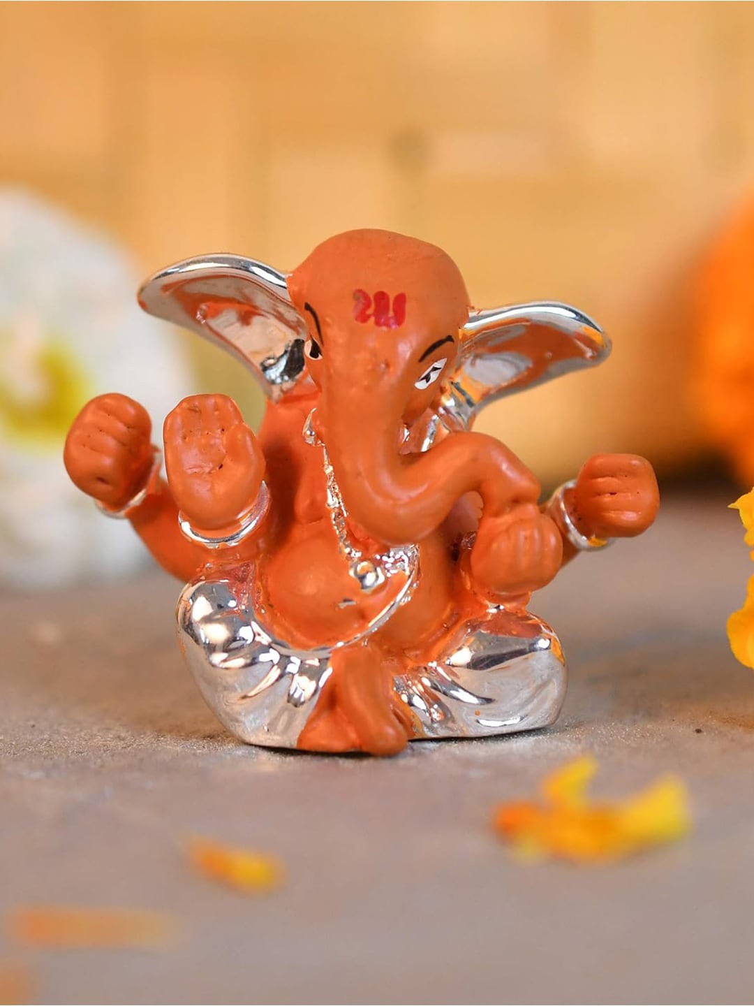 

CraftVatika Orange-Coloured Ganesha Ceramic Idol Showpiece