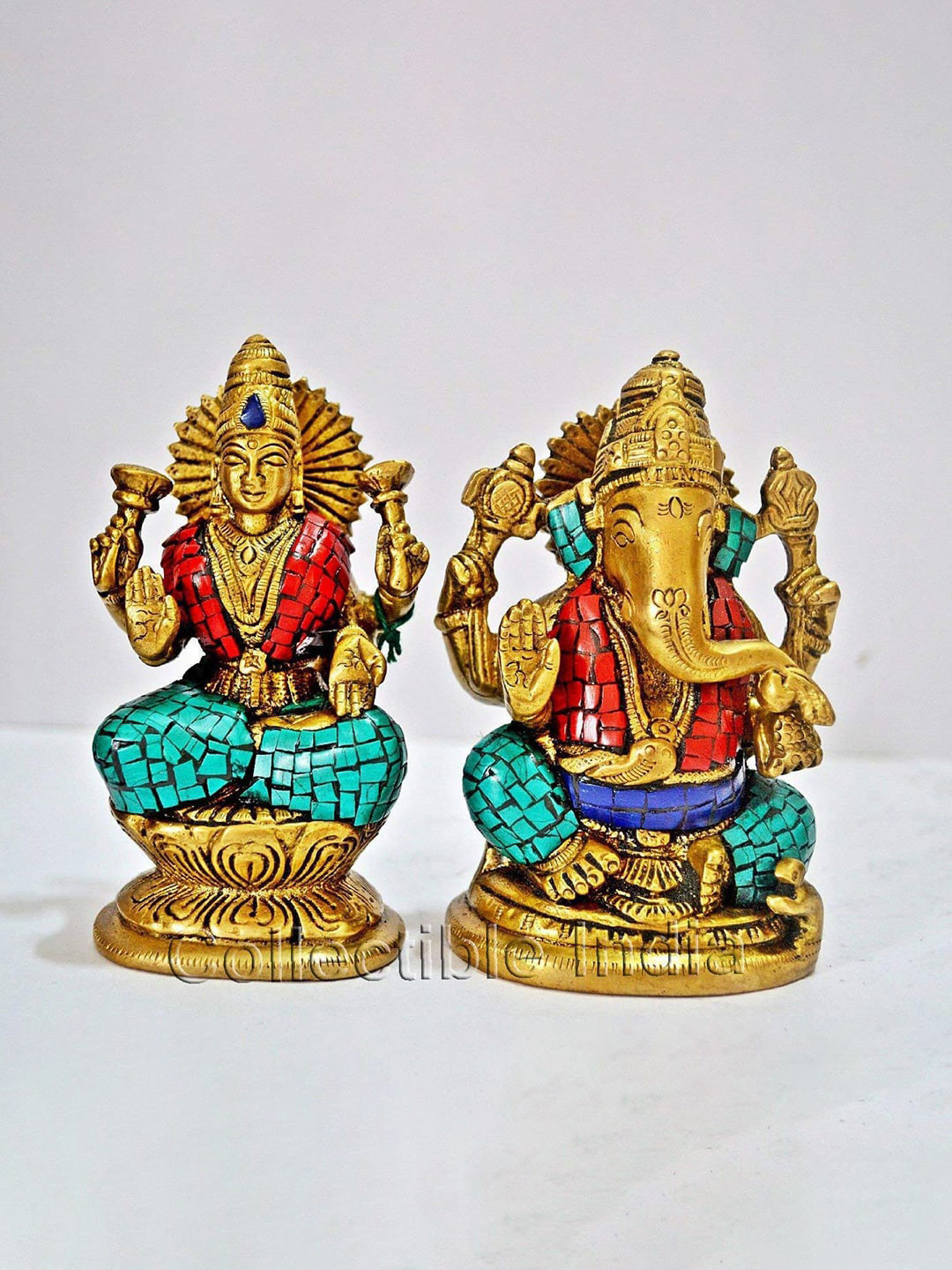 

CraftVatika Gold Toned 2 Pieces Brass God Ganesha Statue Sitting on Lotus Showpieces