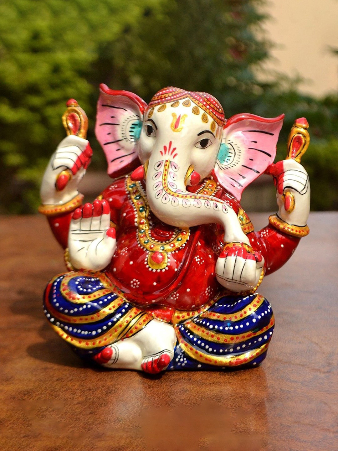 

CraftVatika White & Red Textured Lord Ganpati On Snake Showpiece