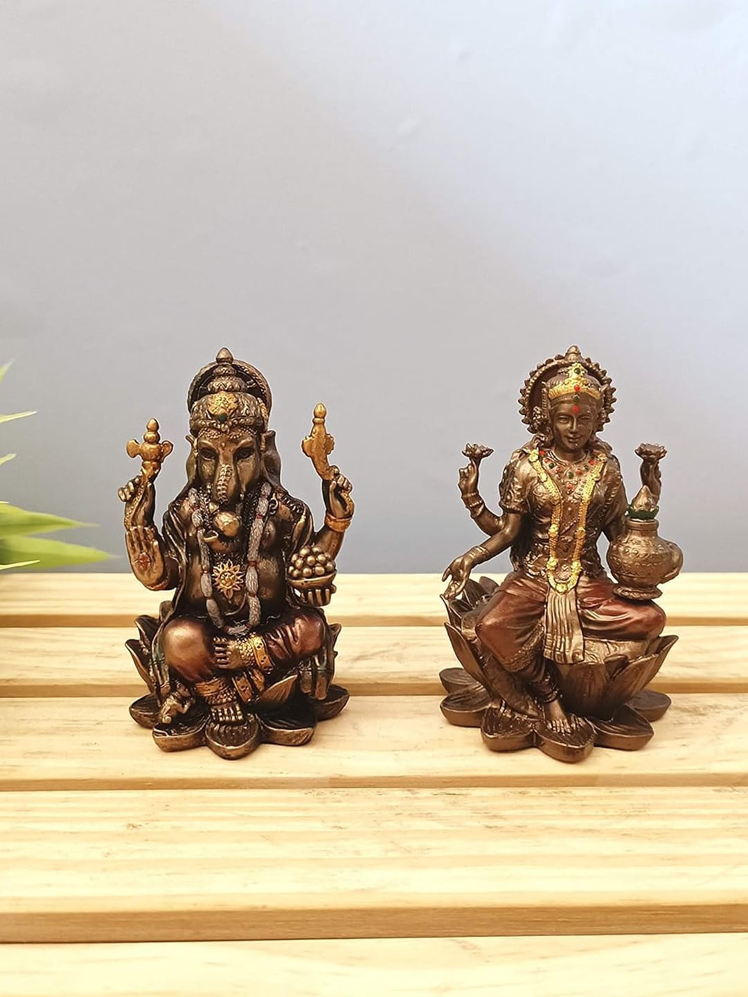 

CraftVatika Copper Toned 2 Pieces Lord Lakshmi Ganesha Idol Showpieces