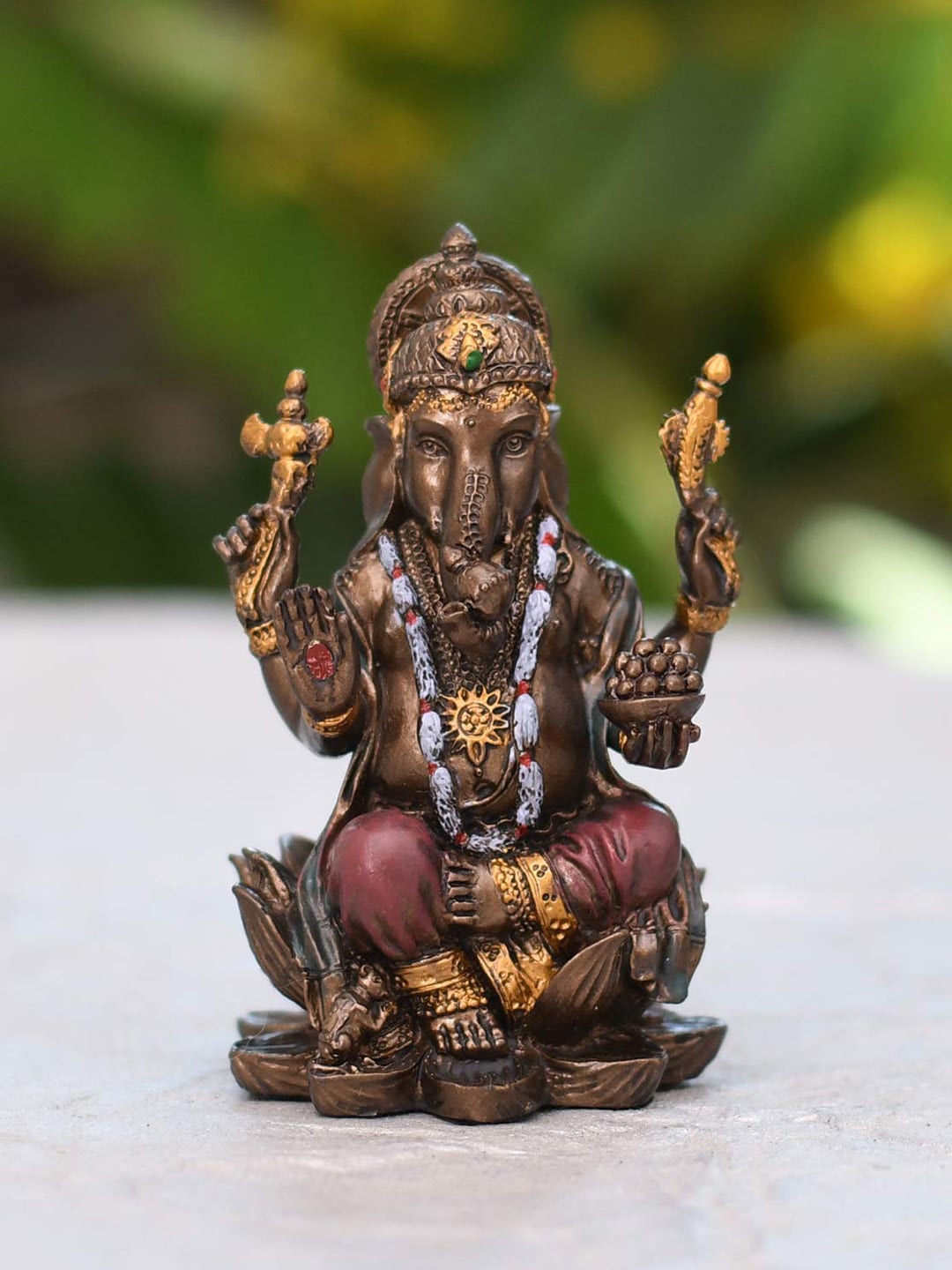 

CraftVatika Brown Lord Ganesh Idol Polyresin Showpiece