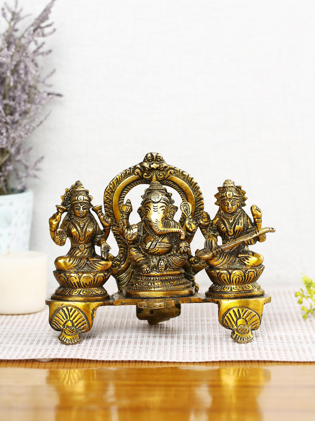 

CraftVatika Brown Textured Ganesha Laxmi Saraswati Brass Idol Showpiece
