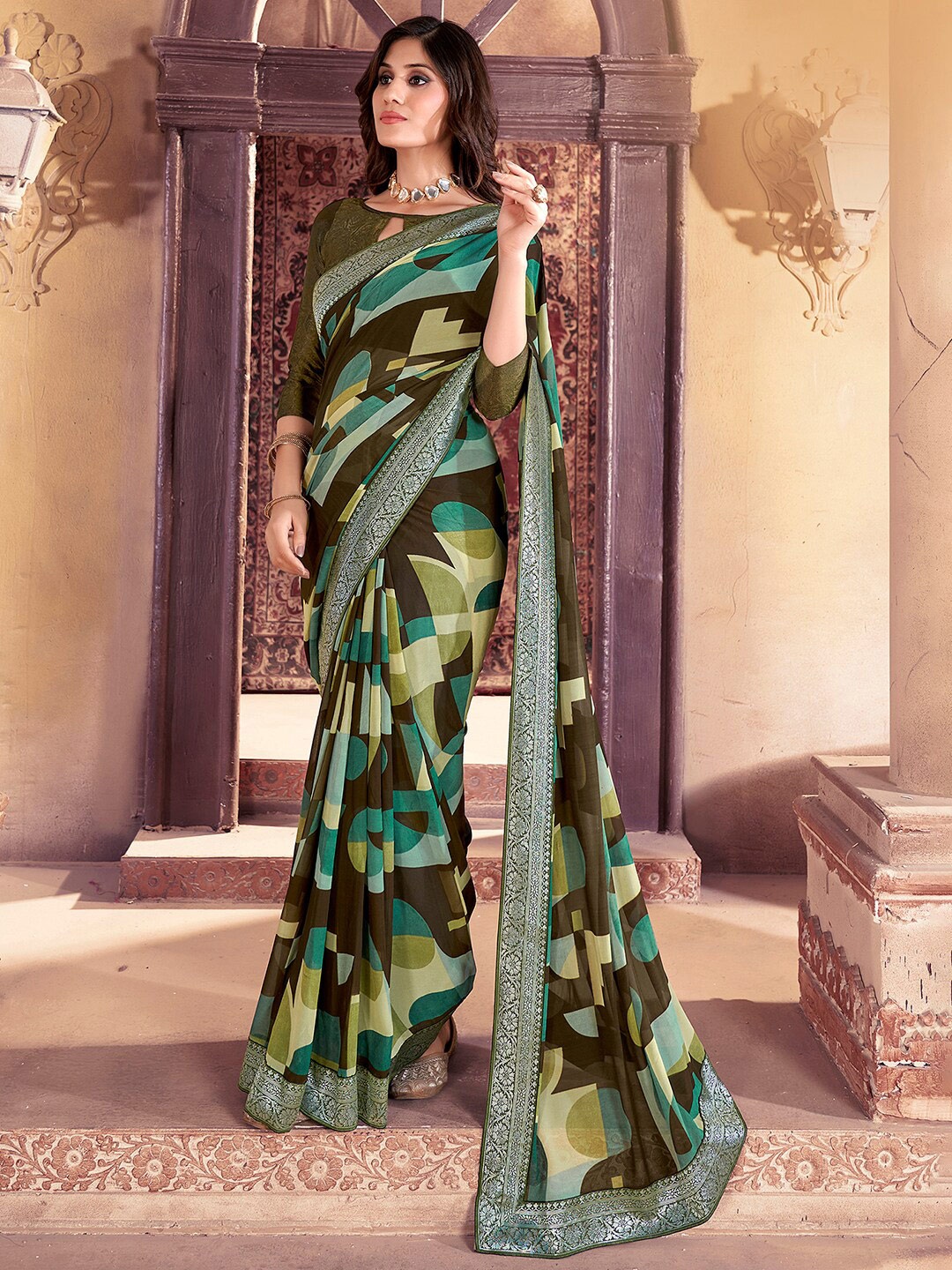 

Saree mall Olive Green Geometric Printed Zari Pure Georgette Sarees