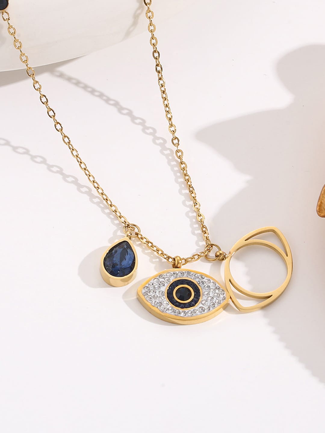 

Jewels Galaxy Set Of 2 Gold Plated & Silver Plated AD Studded Evil Eye Pendants