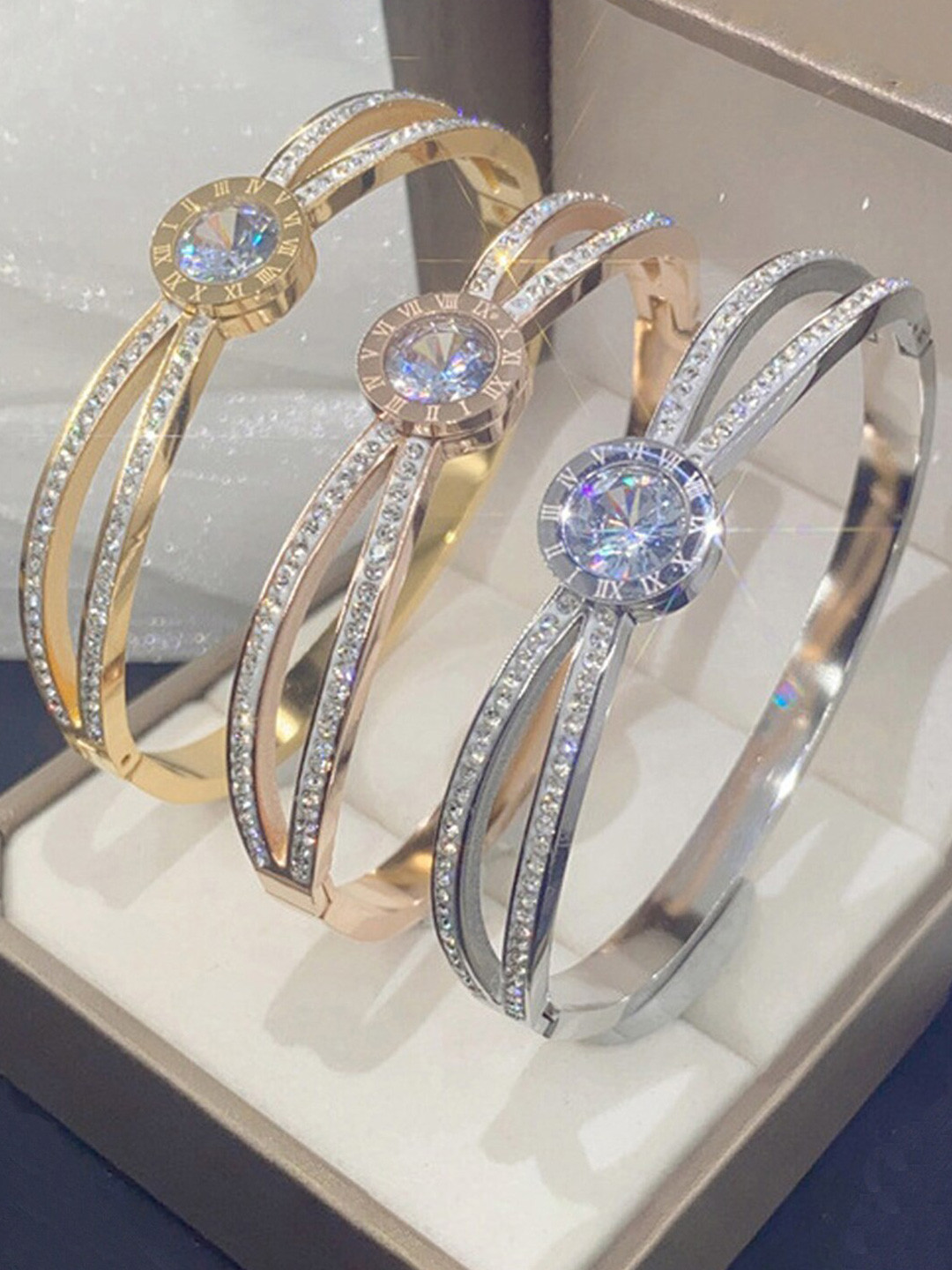 

Jewels Galaxy Set Of 3 Gold Plated AD Studded Stainless Steel Bangle Style Bracelets