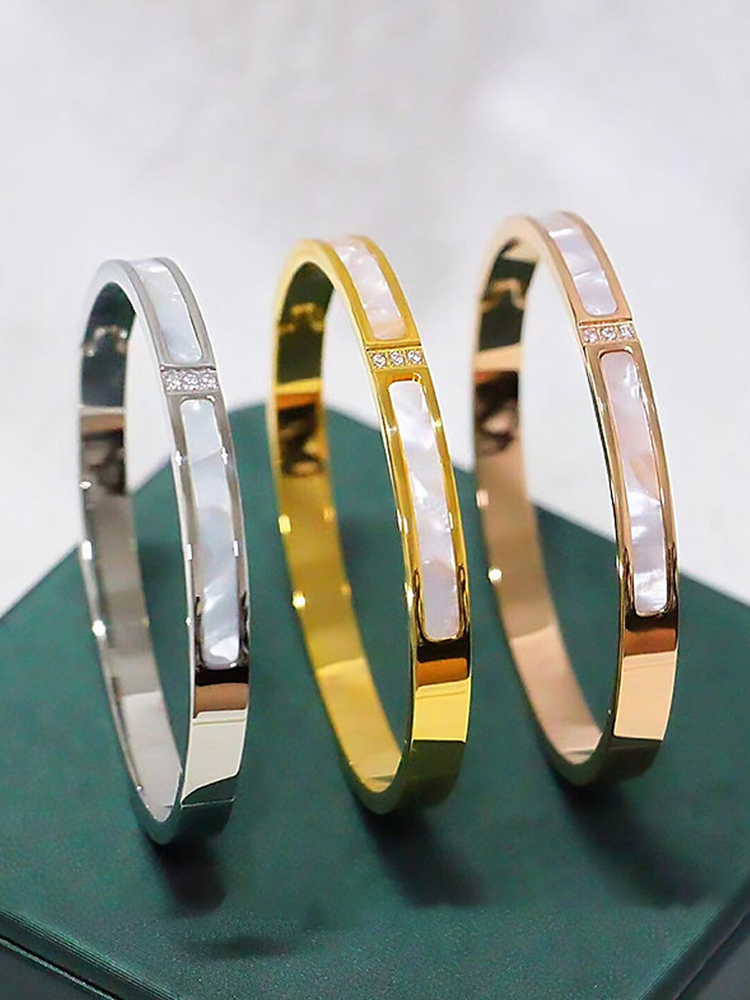 

Jewels Galaxy Set Of 3 Gold, Rose Gold and Silver Plated Stainless Steel Bracelets