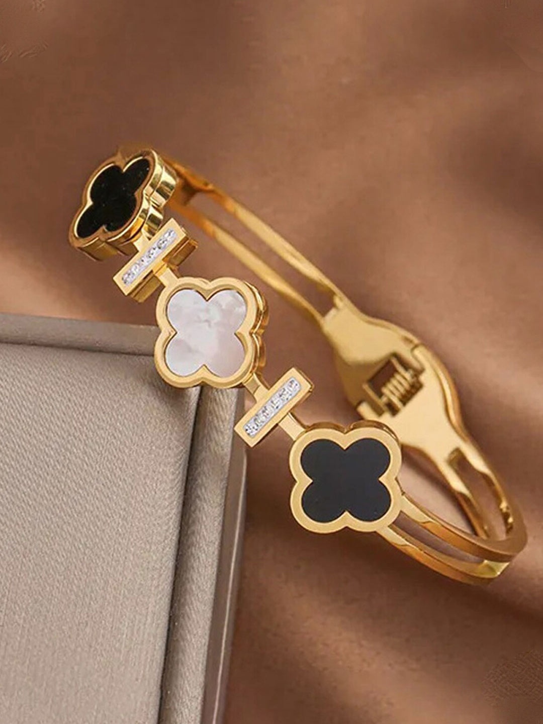 

Jewels Galaxy Women Gold-Plated Mother of Pearl Stainless Steel Bangle-Style Bracelet