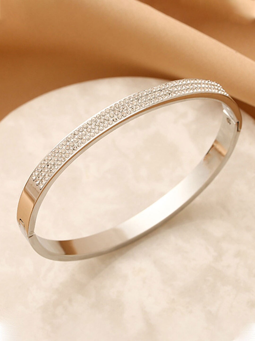 

Jewels Galaxy Women American Diamond Silver-Plated Bangle-Style Bracelet