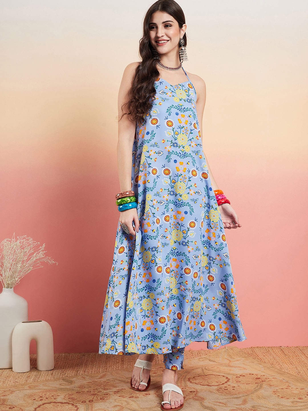 

Sangria Blue Floral Printed Halter Neck A-Line Kurta With Trouser