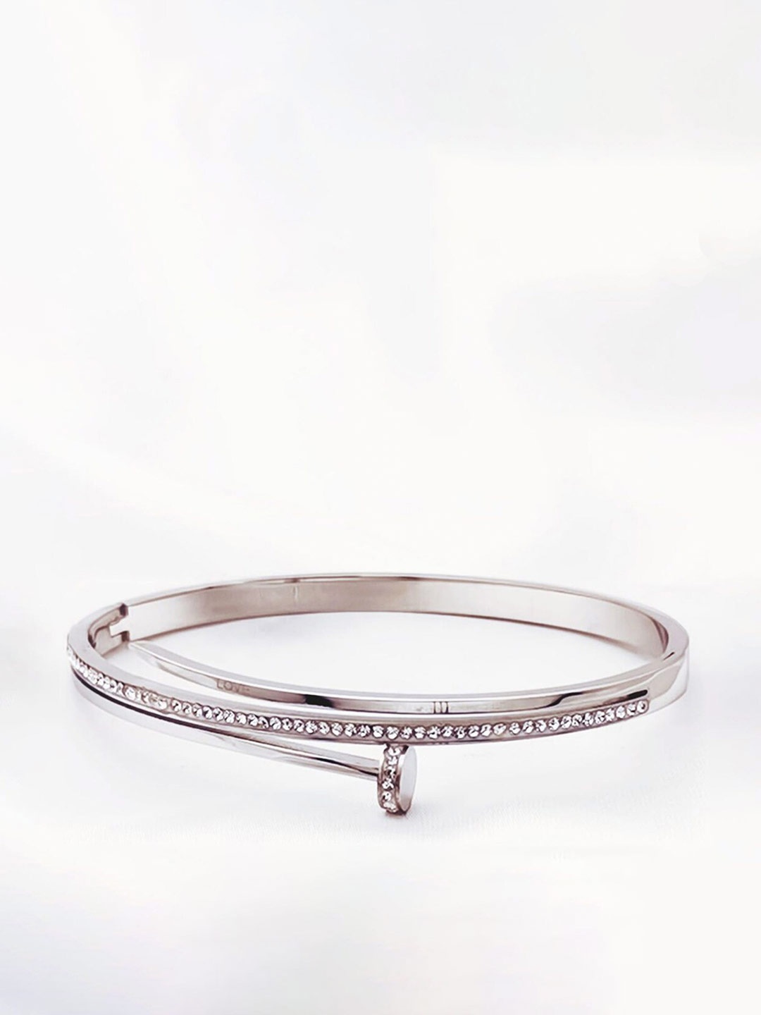 

Designs & You Stainless Steel American Diamond Silver-Plated Bangle-Style Bracelet