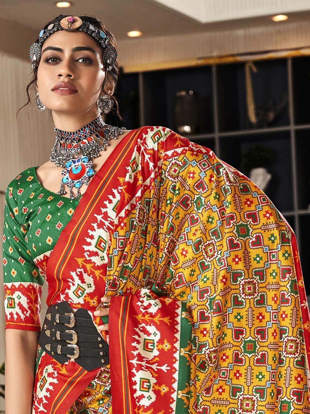 

elora Ethnic Motifs Printed Patola Saree, Yellow
