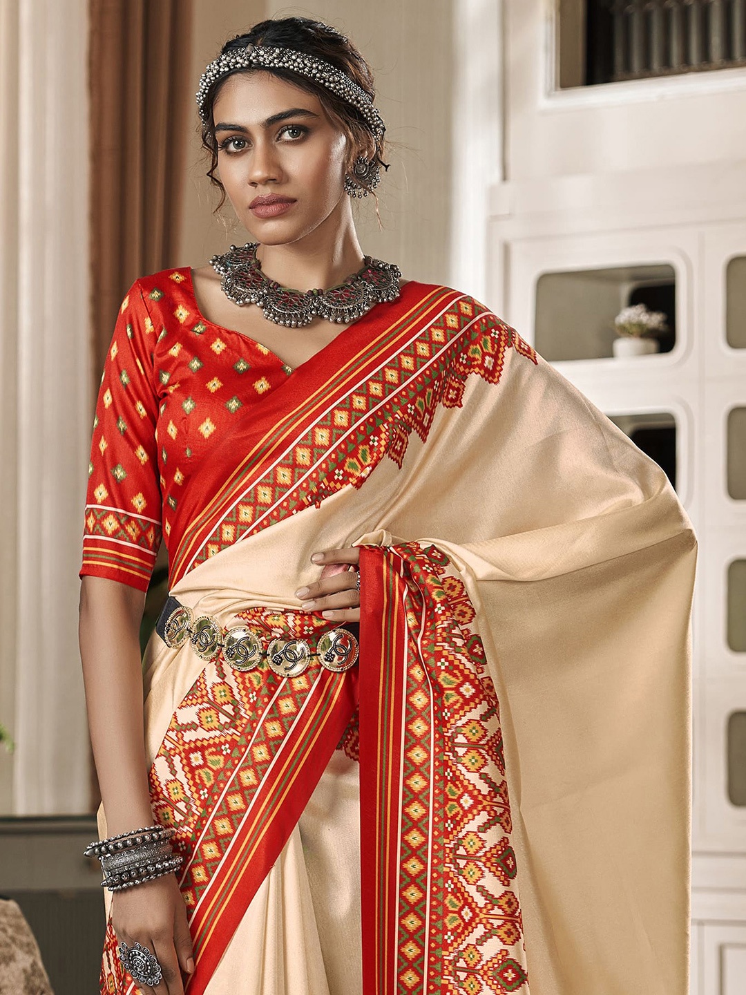 

elora Ethnic Motifs Printed Border Patola Saree, Beige