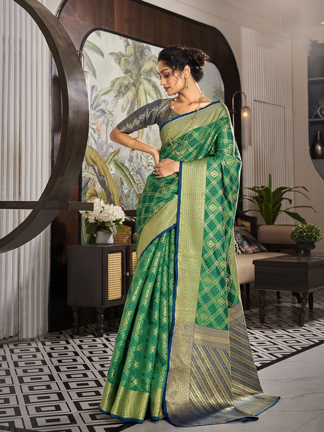 

elora Ethnic Motif Woven Design Zari Patola Saree, Green