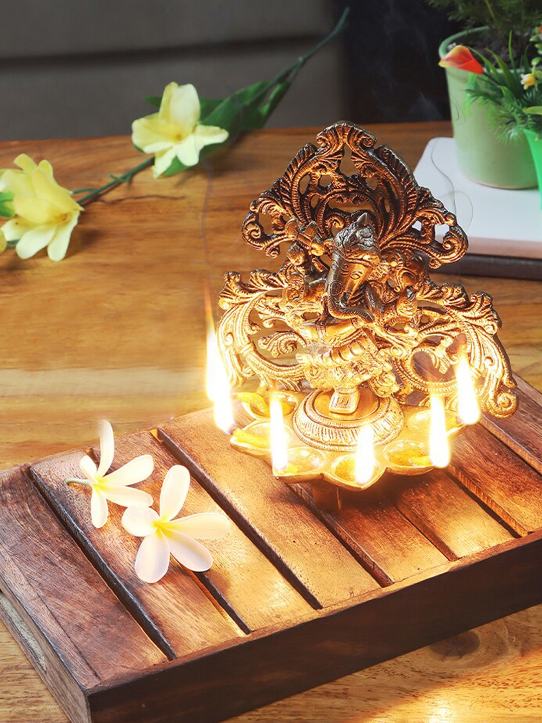 

Two Moustaches Gold Toned Dancing Ganesha Design Five Oil Wick Diya