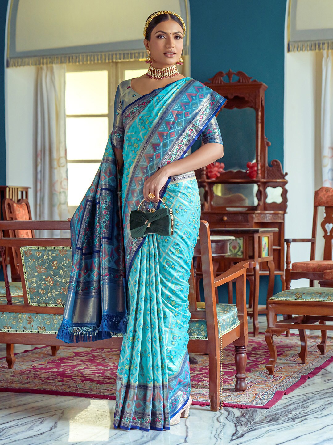

KARAGIRI Ethnic Motifs Woven Design Zari Patola Saree, Turquoise blue