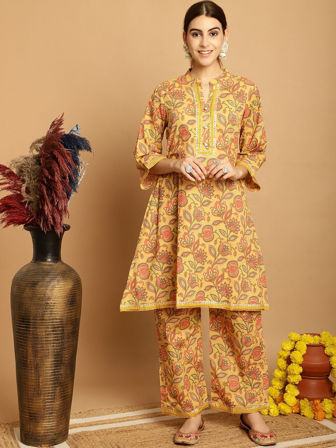 

KALINIFloral Printed Regular Pure Cotton A-Line Kurta with Palazzos, Mustard