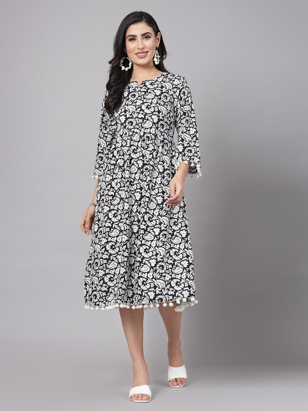 

kipek White & Black Floral Printed A-Line Midi Dress