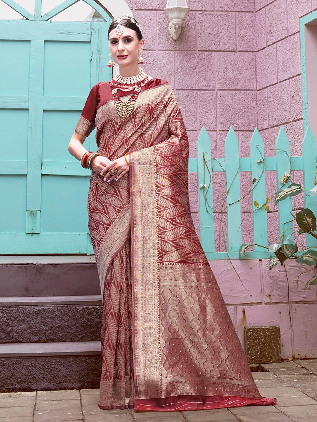 

Anouk Maroon Ethnic Motifs Woven Design Zari Detailed Saree